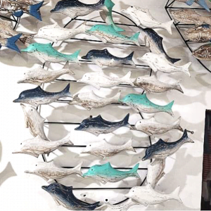Wall Decoration Of A Group Of Green,Blue, White Dolphins