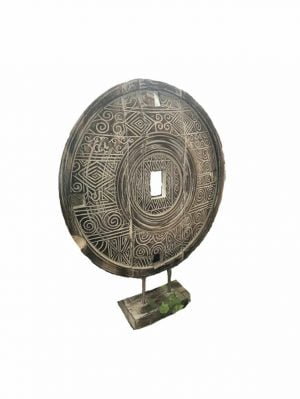 Large standing coin